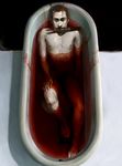  bath bath_of_blood bathing bathtub blood from_above iqo knife male_focus mouth_hold nekromantik nude realistic robert_schmadtke solo 