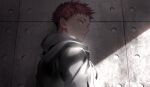  1boy drawstring from_behind glowing glowing_eyes highres hood hood_down hoodie itadori_yuuji jujutsu_kaisen light_particles looking_afar looking_back male_focus orange_eyes red_hair shade short_hair solo tenobe upper_body wall white_hoodie wide-eyed 