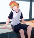  1boy aotu_world baseball_cap black_shorts blonde_hair blue_eyes hair_between_eyes hat highres hood hoodie king_(aotu_world) konana male_focus pointy_ears short_hair short_sleeves shorts sidelocks sitting solo 