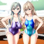  2girls absurdres beach_umbrella blue_swimsuit clothes_writing competition_swimsuit cowboy_shot fence green_eyes hair_ornament hairclip hands_on_hips highres kantai_collection kumano_(kancolle) leaning_forward long_hair looking_at_viewer multicolored_clothes multicolored_swimsuit multiple_girls one-piece_swimsuit purple_swimsuit silver_hair suzuya_(kancolle) swimsuit table takafumi umbrella 