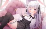  1girl :o ahoge bangs black_legwear blush bow chair cowboy_shot crossed_bangs dated eyebrows_visible_through_hair frilled_straps grey_hair hair_between_eyes hair_bow hair_ornament hair_ribbon hand_up knees_together_feet_apart long_sleeves looking_at_viewer omochi_monaka open_mouth original over-kneehighs pillow pleated_skirt purple_eyes ribbon sample_watermark shirt signature silver_hair skirt solo sparkle tassel thigh_strap thighhighs thighs two_side_up virtual_youtuber white_shirt 