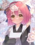  1girl absurdres apron bangs black_kimono blue_bow blush bow brown_eyes cherry_blossoms closed_mouth eyebrows_visible_through_hair floating_hair flower hair_between_eyes hair_bow hand_in_own_hair highres itsuka_neru japanese_clothes kimono kohaku_(tsukihime) looking_at_viewer maid_apron outdoors pink_flower pink_hair short_hair sleeves_past_fingers sleeves_past_wrists smile solo tsukihime upper_body wa_maid white_apron wide_sleeves 