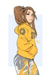  1girl brigitte_(overwatch) brown_eyes brown_hair casual drawstring earrings from_side grey_pants hair_ornament hair_pulled_back hairclip hands_in_pockets highres hood hood_down hoodie jewelry long_hair multicolored_pants overwatch pants ponytail sidelocks solo standing vashperado yellow_hoodie yoga_pants 