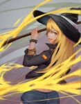  absurdres alternate_costume back bangs blonde_hair bow broom chask collared_jacket fire from_behind hat hat_bow highres jacket kirisame_marisa lipstick long_hair long_sleeves looking_at_viewer makeup mascara patch shorts simple_background smile touhou white_bow witch_hat wrist_cuffs yellow_eyes 
