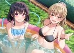  2girls absurdres arms_between_legs bangs bikini black_bikini black_hair blue_bikini braid breasts brown_eyes brown_hair class_no_gyaru_ga_nazeka_ore_no_gimai_to_nakayoku_natta. cleavage closed_mouth commentary_request denim denim_shorts eyebrows_visible_through_hair frilled_bikini frills grass hair_between_eyes hair_ornament hair_scrunchie highres hose komori_kuzuyu large_breasts long_hair multiple_girls nagumo_tsumugi navel open_mouth outdoors purple_eyes scrunchie second-party_source short_hair short_shorts shorts sitting smile swimsuit takarai_yua thighhighs unbuttoned_shorts wading_pool 