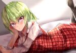  1girl black_legwear breasts cleavage closed_mouth collared_shirt commentary_request dress_shirt eyebrows_visible_through_hair green_hair hair_between_eyes hand_on_own_cheek hand_on_own_face head_tilt highres indoors kazami_yuuka long_sleeves looking_at_viewer lying maboroshi_mochi medium_hair on_stomach pantyhose plaid plaid_skirt plaid_vest red_eyes shirt skirt skirt_set solo touhou vest white_shirt 