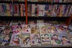  bookshelf highres manga_(object) no_humans otaku_room photo pornography 