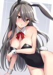  1girl akahi242 animal_ears black_hair black_leotard blush breasts brown_eyes cleavage cowboy_shot detached_collar eyebrows_visible_through_hair fake_animal_ears fake_tail hair_between_eyes hair_ornament hairclip haruna_(kancolle) highres kantai_collection large_breasts leotard long_hair parted_lips rabbit_ears rabbit_tail solo strapless strapless_leotard tail wrist_cuffs 