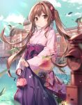  1girl artist_name bag bangs blue_sky blurry blurry_foreground blush breasts brown_eyes brown_hair building cloud commentary_request dated fire_hydrant hair_ribbon hakama hakama_skirt highres holding holding_bag japanese_clothes karory kimono lake leaf light_smile long_hair long_sleeves looking_at_viewer medium_breasts original outdoors pink_kimono pink_ribbon purple_hakama reflection ribbon sidelocks skirt sky solo twintails wide_sleeves 