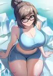  1girl absurdres bike_shorts blue_shorts blue_sports_bra breasts brown_eyes brown_hair cleavage closed_mouth collarbone dated gad_the_god glasses hair_bun highres ice large_breasts mei_(overwatch) navel overwatch shorts sitting solo sports_bra sportswear thighs twitter_username 