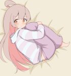  1girl ahoge barefoot bed_sheet brown_eyes commentary from_above full_body highres hood hood_down hugging_own_legs light_blush long_hair looking_at_viewer lying on_side onii-chan_wa_oshimai! oyama_mahiro pink_hair solo unkimo very_long_hair 