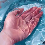  1other bubble caustics commentary_request hand_focus open_hand original partially_submerged realistic refraction solo sunlight water yasuta_kaii32i 