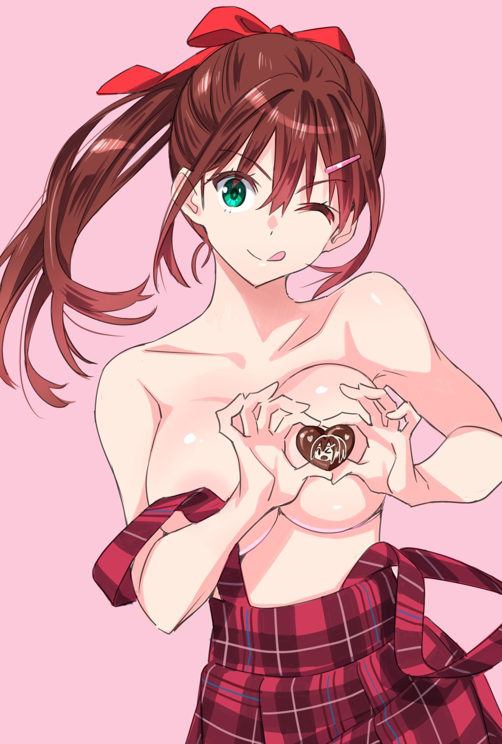 1boy breasts candy chinatsu_(suzutsuki_kurara) chocolate closed_mouth food green_eyes heart heart-shaped_chocolate highres long_hair looking_back medium_breasts one_eye_closed original overalls pink_background ponytail red_hair simple_background smile solo suzutsuki_kurara tongue tongue_out topless