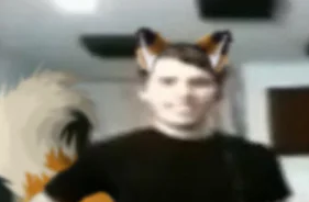 black_clothing black_hair black_shirt black_topwear canid canine clothing fart fox hair humanoid jerma985 low_res male mammal shirt simple_background smile smiling_at_viewer solo topwear unknown_artist white_background