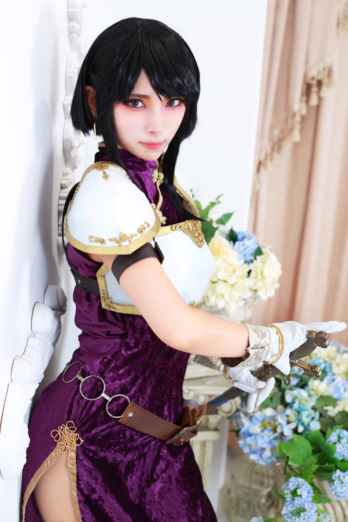 1girl armor asian belt black_hair breastplate cosplay cosplay_photo earrings fire_emblem fire_emblem:_genealogy_of_the_holy_war flower gloves highres holding holding_sword holding_weapon jewelry larcei_(fire_emblem) looking_at_viewer photo_(medium) purple_eyes purple_tunic short_hair shoulder_armor solo sword tunic weapon yolda_cos