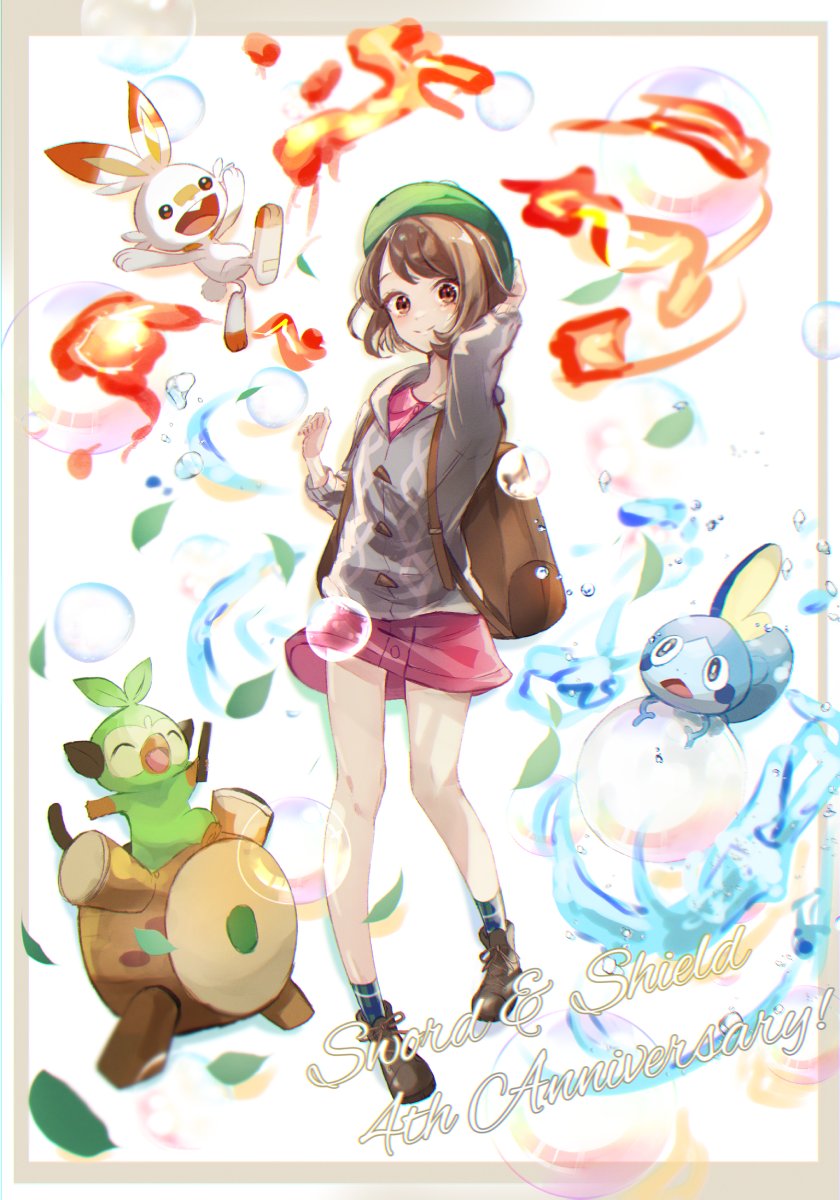 1girl anniversary backpack bag bob_cut boots brown_bag brown_eyes brown_footwear brown_hair buttons cable_knit cardigan closed_mouth collared_dress commentary_request copyright_name dress eyelashes fire gloria_(pokemon) green_headwear green_socks grey_cardigan grookey hat highres hooded_cardigan knees leaf legs looking_at_viewer pink_dress plaid_socks pokemon pokemon_(creature) pokemon_(game) pokemon_swsh scorbunny short_hair smile sobble socks ssn_(sasa8u9r) starter_pokemon_trio tam_o'_shanter water