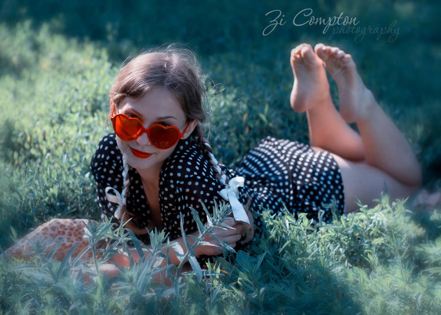 1girl barefoot cosplay costume dolores_haze_(nabokov's_lolita) feet grass outside photo solo sunglasses tagme
