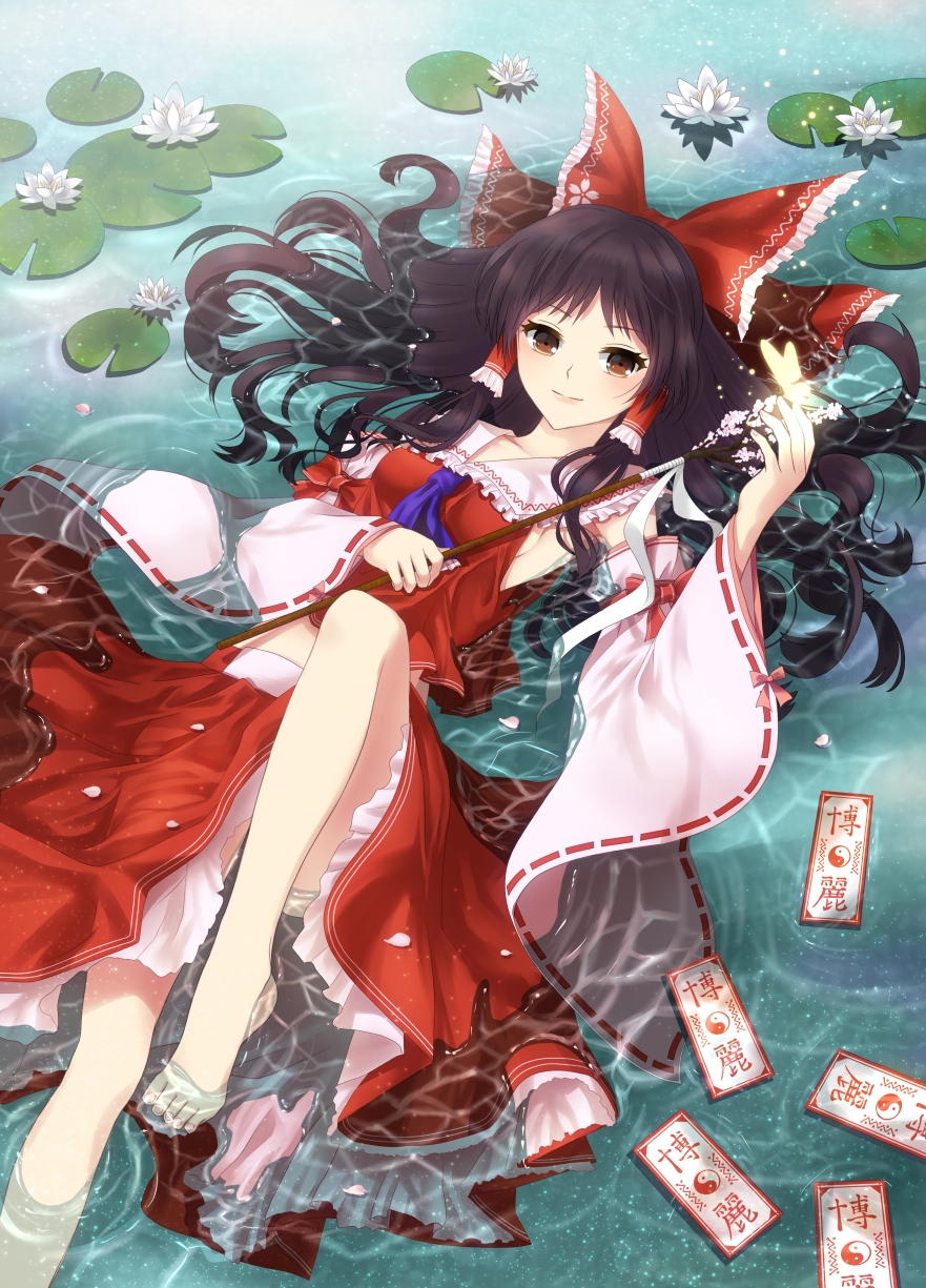 ascot bad_id bad_pixiv_id barefoot bow brown_eyes brown_hair bug butterfly detached_sleeves gohei hair_bow hair_tubes hakurei_reimu highres insect lily_pad long_hair lying no_bra nunucco ofuda skirt solo submerged touhou water