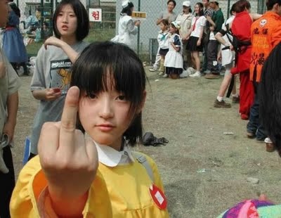 asian black_hair child funny japan korea korean loli lowres middle_finger photo real school_uniform