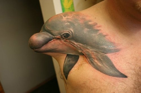 body_hair cetacean chest_hair dolphin feral human male mammal marine photo real soldier solo tattoo unknown_artist