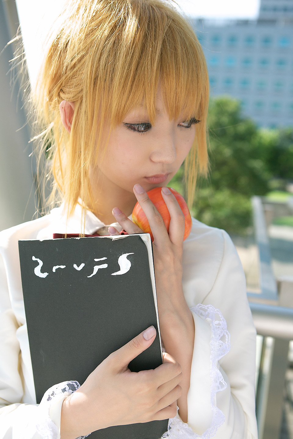 amane_misa apple blonde_hair book cosplay death_note food fruit highres photo