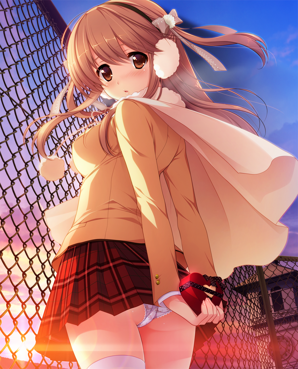 backlighting blush bow brown_eyes brown_hair capelet chain-link_fence earmuffs fence from_below gift hairband hatsukoi_1/1 highres koizumi_amane lens_flare long_hair long_sleeves looking_at_viewer morino_yukino outdoors panties pantyshot plaid plaid_skirt skirt solo sunset thighhighs underwear white_legwear white_panties