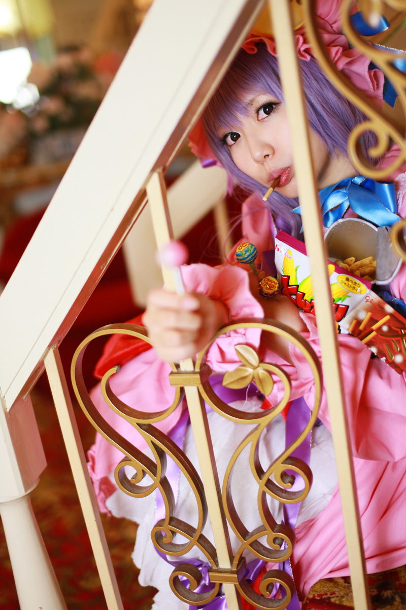 1girl asian candy cosplay crescent dress female hat highres lollipop long_hair patchouli_knowledge photo purple_hair solo tenshi_myu touhou