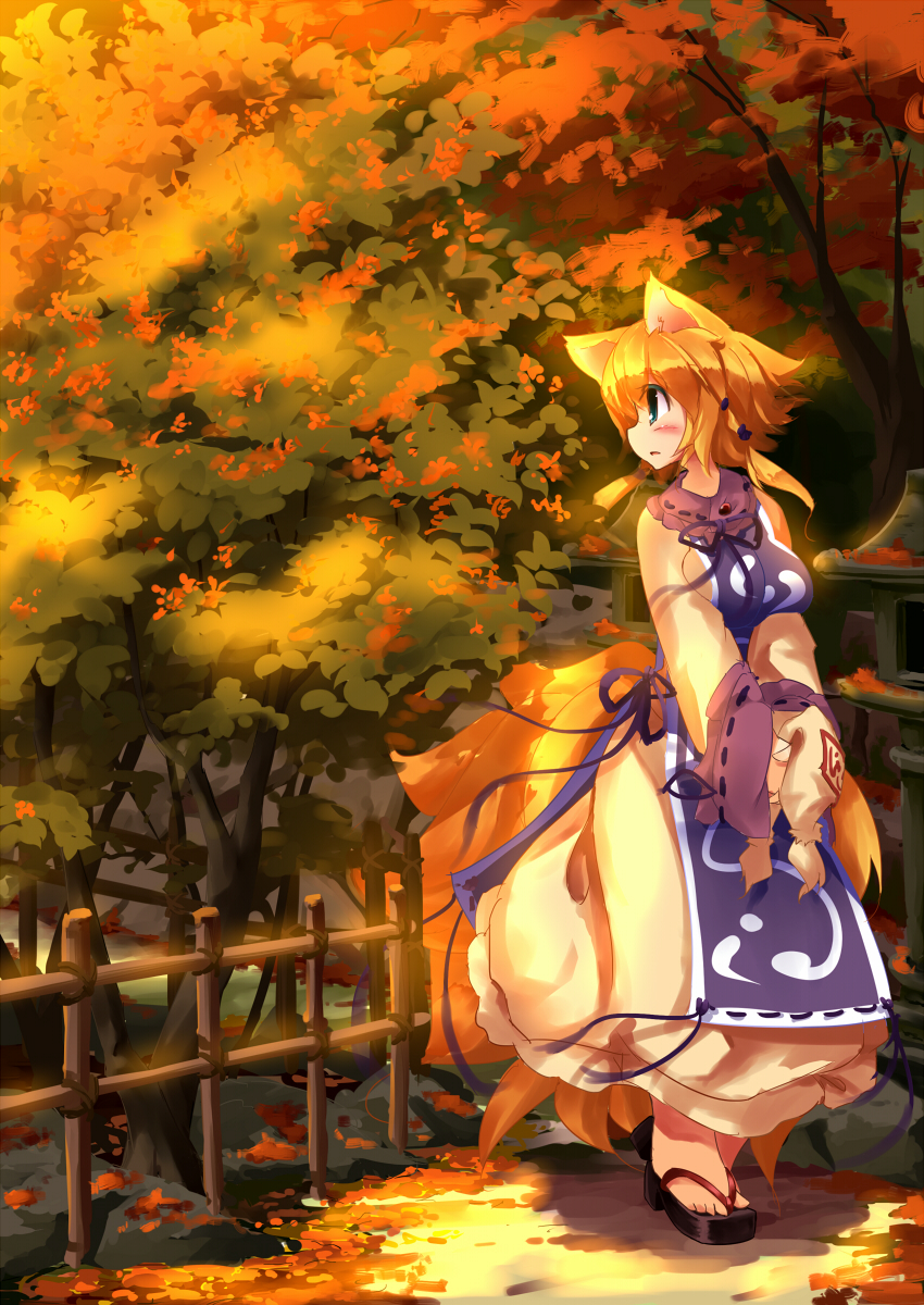 animal_ears blonde_hair blue_eyes breast_squeeze breasts clog_sandals dress fence fox_ears fox_tail hat hat_removed headwear_removed highres koha large_breasts long_sleeves looking_back multiple_tails solo sunset tabard tail touhou tree v_arms white_dress wide_sleeves yakumo_ran