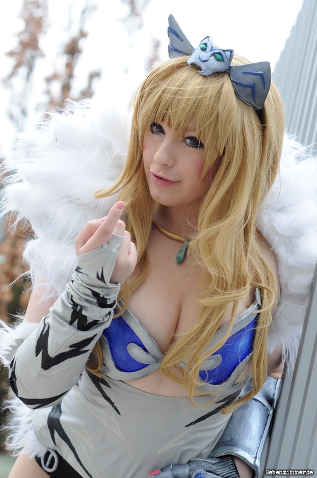 1girl armor blonde_hair blue_eyes breasts cleavage cosplay elina elina_(cosplay) hairband jewelry k-a-n-a kana large_breasts long_hair photo queen's_blade queen's_blade solo