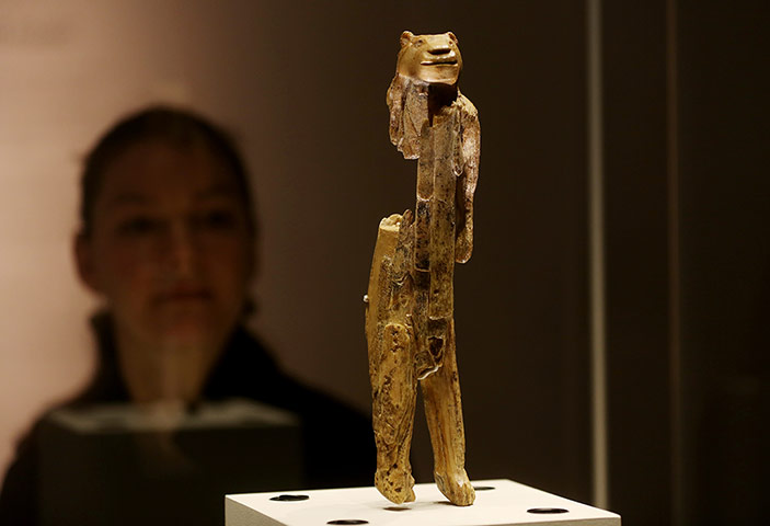 ambiguous_gender ancient art feline female gallery human ivory lion mammal real relic sculpture standing statue unknown_artist