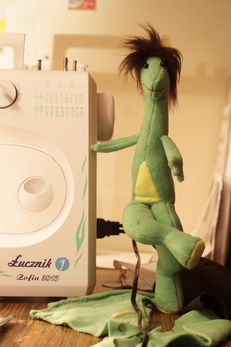 a animated arm_support brown_hair crossed_legs dot draconek dragon eye eyes fabric freddy hair hand hands hug leaning like lizard machine me mechanical paws plushie real reptile scalie sew sewing sewing_machine sir smile soft standing toy work_in_progress