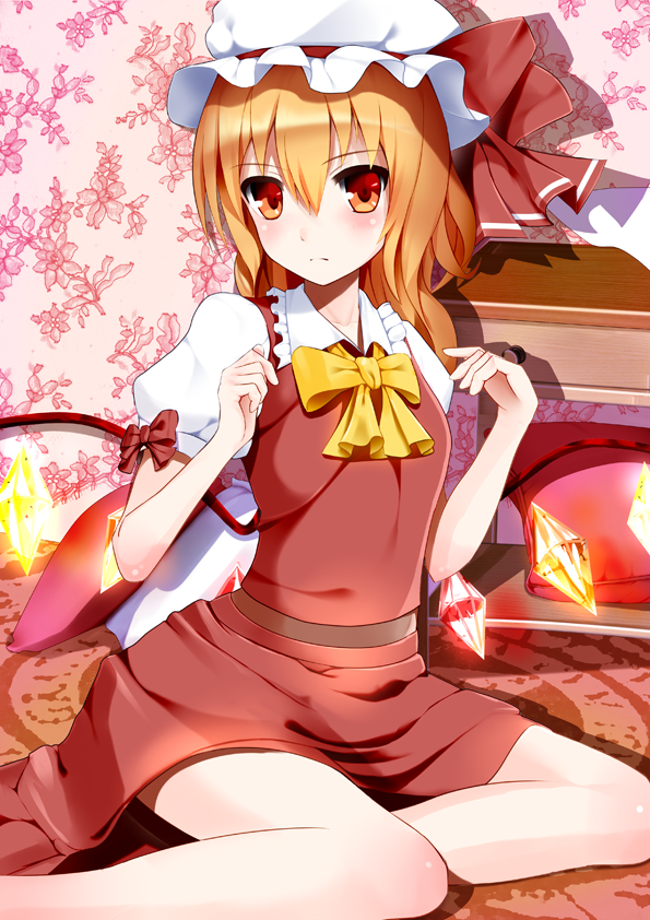 bed blonde_hair blush bow bowtie flandre_scarlet floral_background hat hat_ribbon henet_hene long_hair on_bed pillow red_eyes ribbon shadow skirt skirt_set solo touhou wings