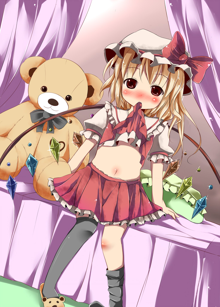 bed black_legwear blonde_hair blush bow canopy_bed flandre_scarlet hat hat_bow kazura looking_at_viewer midriff mob_cap mouth_hold navel on_bed pillow puffy_sleeves red_eyes shirt_lift short_sleeves side_ponytail sitting sitting_on_bed skirt skirt_set slippers solo stuffed_animal stuffed_toy teddy_bear thighhighs thighhighs_pull touhou wings