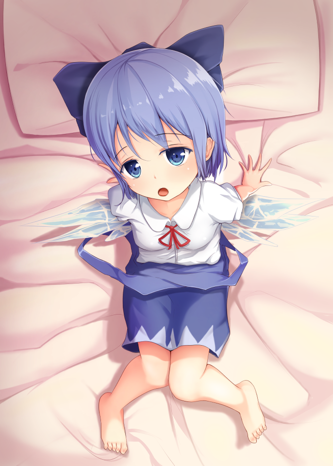 arm_support barefoot bed_sheet blue_eyes blue_hair blush bow cirno feet from_above hair_bow looking_at_viewer looking_up open_mouth ouka_(ra-raradan) pillow ribbon short_hair solo touhou