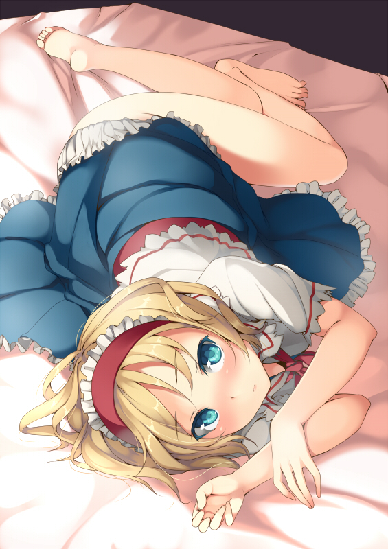 1girl alice_margatroid barefoot bed blonde_hair blue_eyes blush capelet dress feet hairband looking_at_viewer lying on_side short_hair solo touhou unasaka_ryou