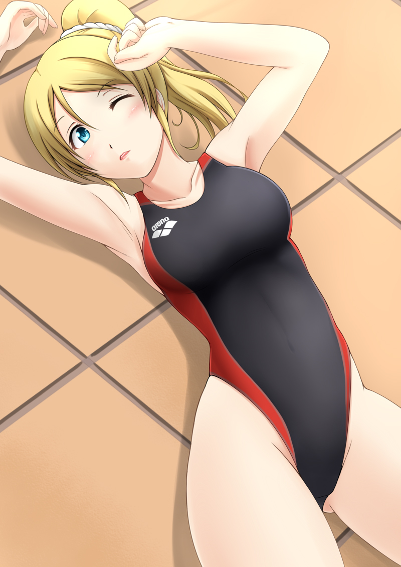 arena_(company) ayase_eli blonde_hair blue_eyes competition_swimsuit fuuma_nagi long_hair love_live! love_live!_school_idol_project lying one-piece_swimsuit one_eye_closed ponytail solo swimsuit