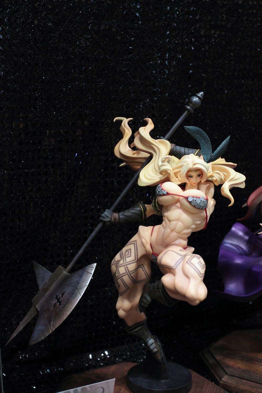 abs amazon amazon_(dragon's_crown) amazon_(dragon's_crown) anatomical_nonsense armor bad_anatomy bikini_armor blonde_hair breasts dragon's_crown dragon's_crown extreme_muscles feathers figure george_kamitani gloves halberd highres hips large_breasts legs long_hair muscle muscles polearm tattoo thick_thighs thighs vanillaware weapon