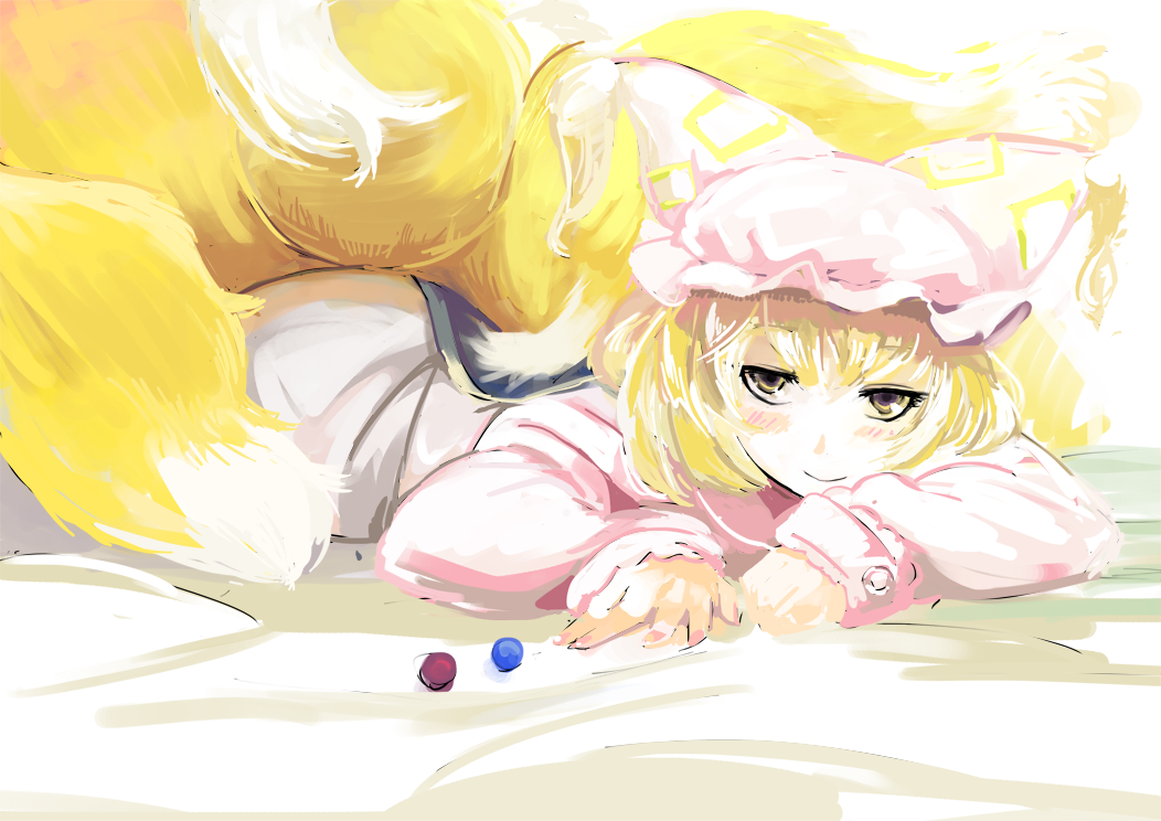 blonde_hair commentary_request dress fox_tail hat kyuubi long_sleeves looking_at_viewer lying multiple_tails on_stomach pillow_hat sinzan smile solo tabard tail touhou white_dress yakumo_ran yellow_eyes