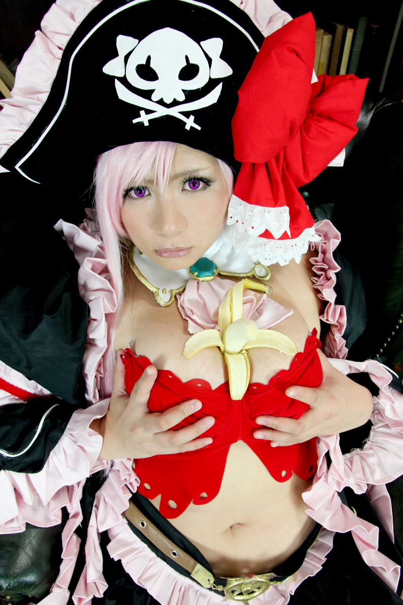 1girl banana breasts captain_liliana captain_liliana_(cosplay) chouzuki_maryou cosplay food fruit hat highres large_breasts lost_worlds photo pink_hair pirate pirate_hat plump purple_eyes queen's_blade queen's_blade queen's_blade_rebellion sexually_suggestive