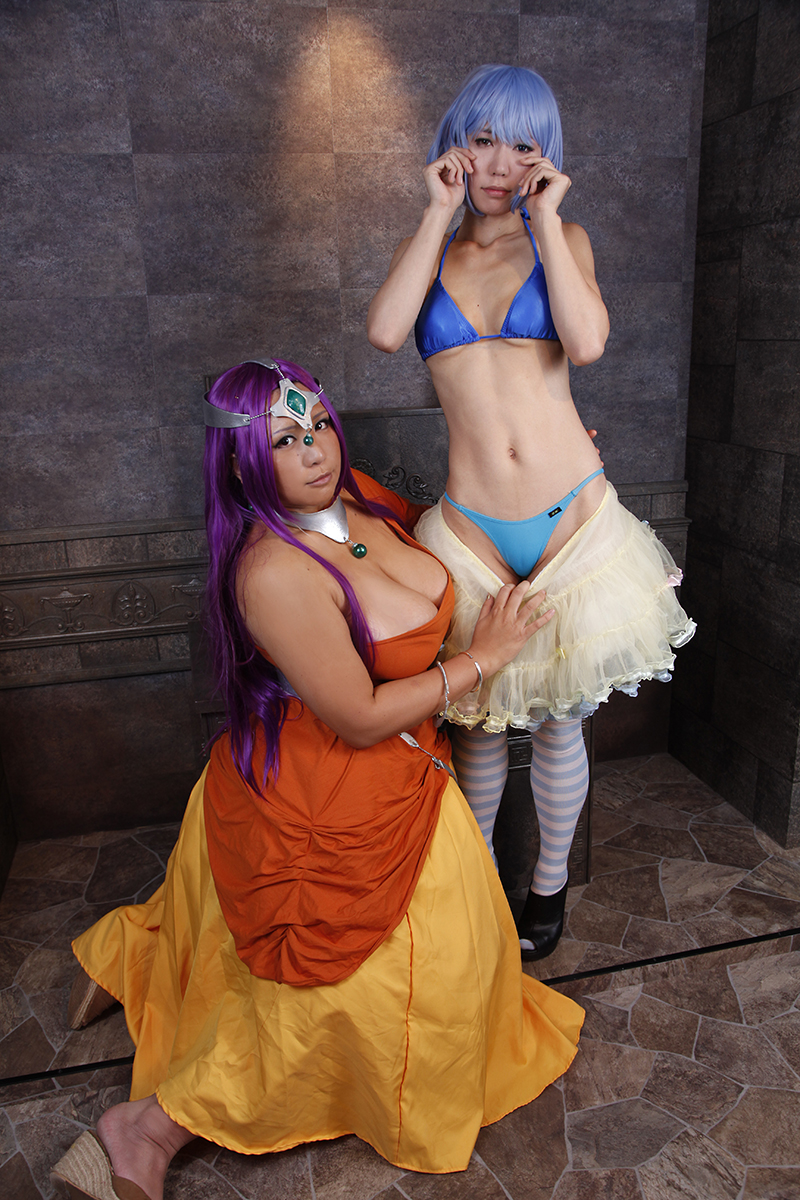 2girls asian blue_eyes blue_hair breasts brown_eyes cameltoe chouzuki_maryou cosplay dragon_quest dragon_quest_iv heterochromia large_breasts minea minea_(cosplay) multiple_girls photo plump purple_hair square_enix