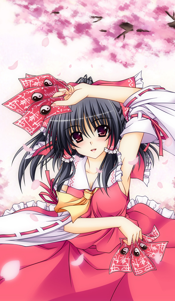 :d aoi_hiro arm_up armpits ascot black_hair bow breasts cherry_blossoms detached_sleeves hair_bow hair_ribbon hair_tubes hakurei_reimu holding long_hair looking_at_viewer medium_breasts nontraditional_miko ofuda open_mouth petals ribbon smile solo touhou wind