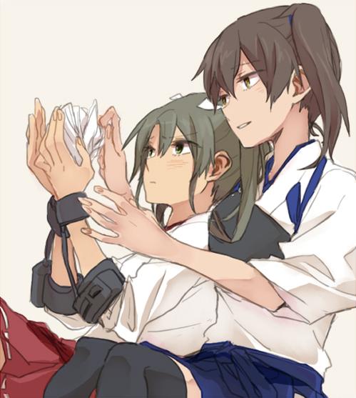 bad_id bad_twitter_id beige_background black_legwear blush brown_eyes brown_hair commentary eyebrows_visible_through_hair eyes_visible_through_hair green_eyes green_hair hair_between_eyes hakama_skirt kaga_(kantai_collection) kantai_collection multiple_girls muneate parted_lips ree_(re-19) side_ponytail simple_background tasuki thighhighs towel_bunny twintails zuikaku_(kantai_collection)