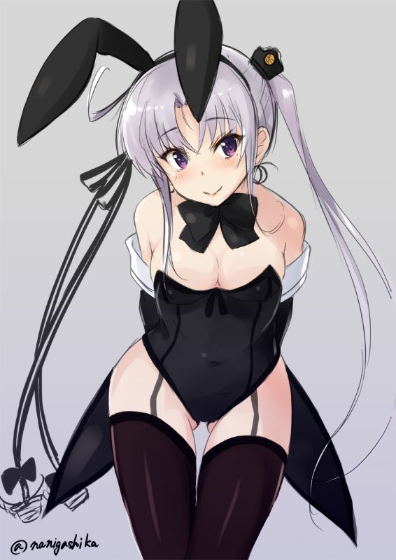 1girl ahoge akitsushima_(kantai_collection) anchor anchor_hair_ornament animal_ears arms_behind_back black_legwear black_leotard black_neckwear bow bowtie breasts bunny_ears bunny_tail bunnysuit cleavage commentary_request cowboy_shot detached_collar garter_straps grey_background hair_ornament hair_ribbon hat kantai_collection kochipu leaning_forward leotard long_hair looking_at_viewer medium_breasts mini_hat purple_eyes purple_hair ribbon side_ponytail sidelocks simple_background solo standing strapless strapless_leotard tail thighhighs twitter_username wrist_cuffs