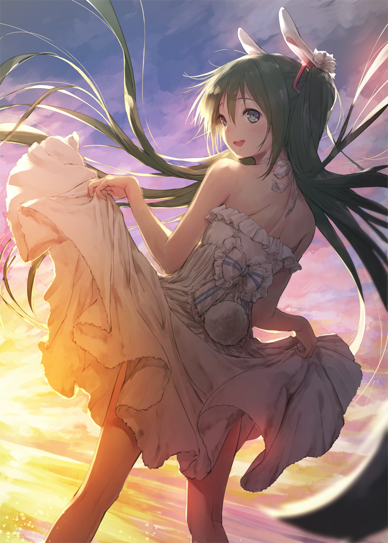 1girl animal_ears blush bow bunny_ears bunny_tail cloud cloudy_sky commentary_request cowboy_shot dress dress_lift ek_masato frills from_behind green_eyes green_hair hair_ornament hatsune_miku long_hair looking_back ocean sky sleeveless sleeveless_dress smile solo sunrise tail twintails very_long_hair vocaloid white_dress