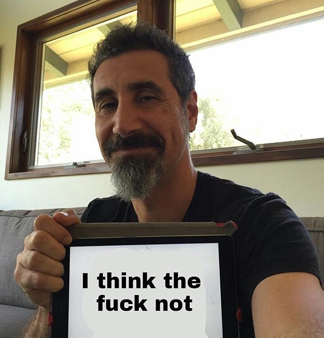 clothed clothing holding_object human humor invalid_tag looking_at_viewer male mammal music musician serj_tankian solo system_of_a_down