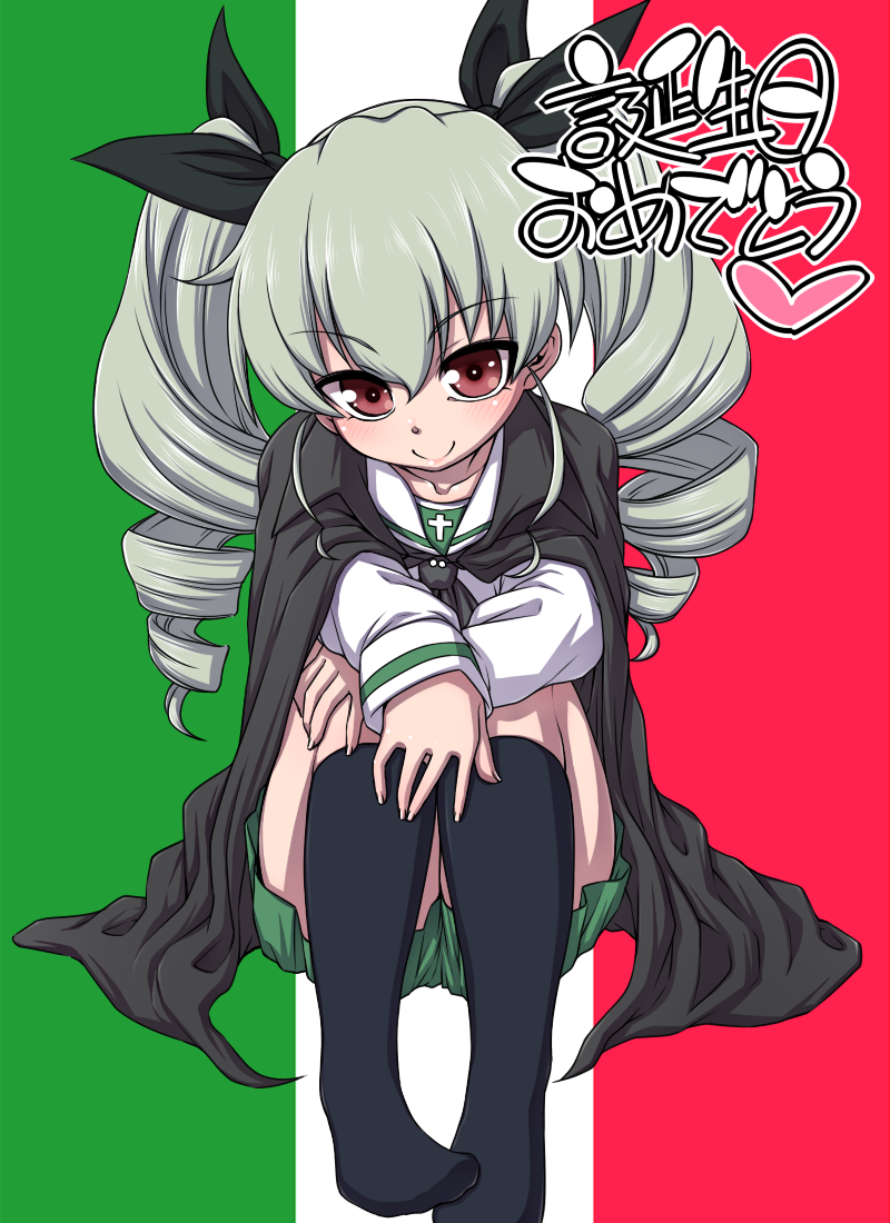 alternate_costume anchovy bangs black_legwear black_neckwear black_ribbon blouse capelet closed_mouth commentary drill_hair flag_background full_body girls_und_panzer green_hair green_skirt hair_ribbon hanya_(hanya_yashiki) happy_birthday italian_flag kneehighs leg_hug long_hair long_sleeves looking_at_viewer miniskirt neckerchief no_shoes ooarai_school_uniform pleated_skirt red_eyes ribbon school_uniform serafuku skirt smile solo translated twin_drills twintails white_blouse