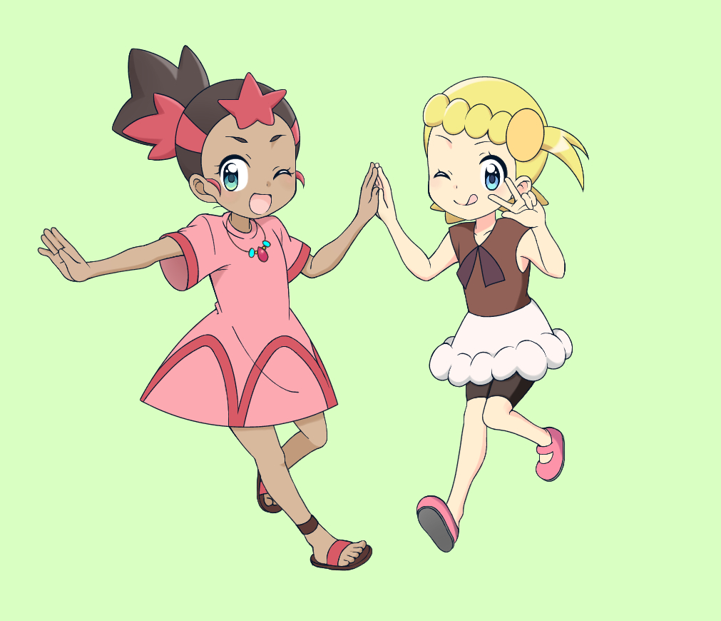 2girls arm_up bike_shorts blonde_hair blush brown_footwear brown_hair brown_shirt child closed_mouth collarbone creatures_(company) dark_skin dress eureka_(pokemon) female flat_chest full_body game_freak green_background hair_ornament hand_holding hand_up hands_up happy hoshi_(pokemon) jewelry koudzuki_(reshika213) licking_lips light_blush looking_at_viewer looking_to_the_side miniskirt multicolored_hair multiple_girls necklace nintendo one_eye_closed open_mouth outstretched_arm pink_dress pink_footwear pokemon pokemon_(anime) pokemon_sm_(anime) pokemon_xy_(anime) ponytail red_hair sandals shirt shoes short_sleeves side_ponytail simple_background skirt sleeveless sleeveless_shirt smile standing standing_on_one_leg tied_hair tongue tongue_out two-tone_hair v white_skirt wink