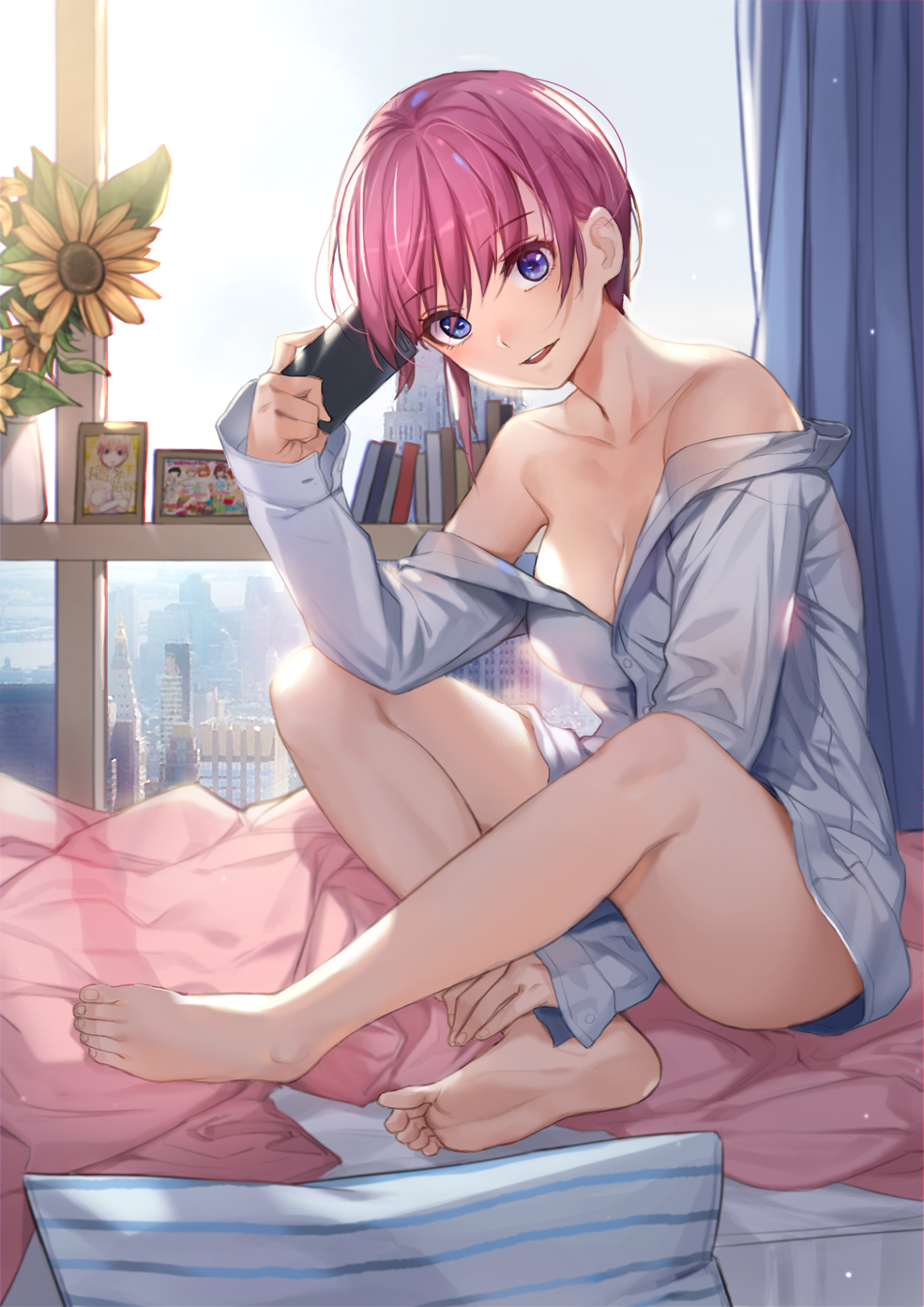 1girl bangs bare_shoulders barefoot bed blue_eyes book breasts building cellphone cityscape cleavage collarbone dress_shirt eyebrows_visible_through_hair feet flower full_body go-toubun_no_hanayome grey_shirt head_tilt highres holding holding_cellphone holding_phone indoors long_sleeves looking_at_viewer medium_breasts nakano_ichika naked_shirt off_shoulder on_bed open_mouth oversized_clothes oversized_shirt phone photo_(object) pillow pink_hair piyo_(pixiv_2308057) shirt short_hair sitting sleeves_past_wrists smile soles solo sunflower sunlight teeth window