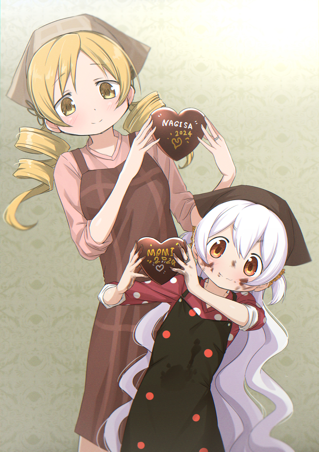 2girls abutomato apron black_apron black_headwear blonde_hair brown_apron brown_eyes brown_headwear candy chocolate chocolate_on_face closed_mouth commentary_request drill_hair food food_on_body food_on_face green_background head_scarf heart heart-shaped_chocolate highres holding holding_chocolate holding_food long_hair looking_at_viewer mahou_shoujo_madoka_magica mahou_shoujo_madoka_magica_(anime) medium_hair momoe_nagisa multiple_girls smile tomoe_mami twin_drills valentine very_long_hair white_hair yellow_eyes