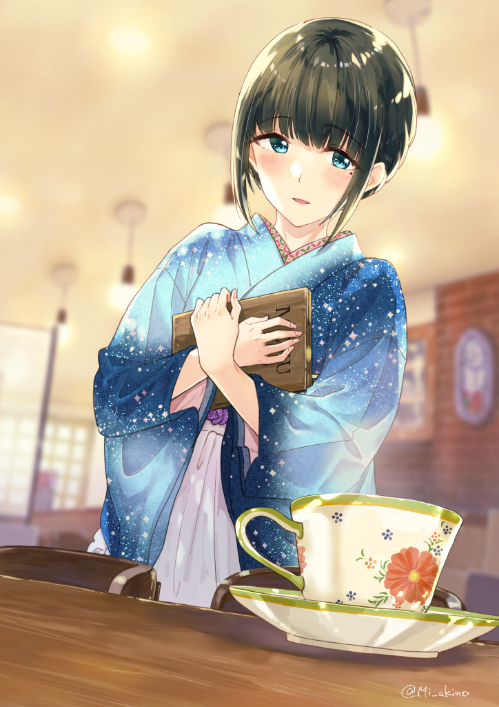 1girl apron bangs black_hair blue_eyes blue_kimono blurry blurry_background blush brick_wall chair coffee_wo_shizuka_ni commentary_request cup depth_of_field eyebrows_visible_through_hair frilled_apron frills indoors japanese_clothes kimono long_sleeves looking_at_viewer miyabi_akino mole mole_under_eye object_hug parted_lips saucer shizuka_(coffee_wo_shizuka_ni) sidelocks smile solo table twitter_username waist_apron white_apron wide_sleeves